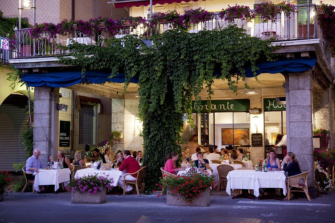 Town restaurant at dusk, Bellagio, Lake Como, Lombardy, Italy, Europe