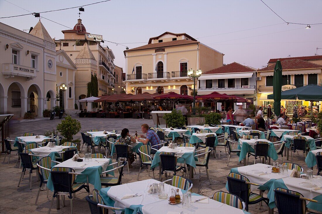Restaurants at dusk, St. Markos Square, Zakynthos Town, Zakynthos, Ionian Islands, Greek Islands, Greece, Europe