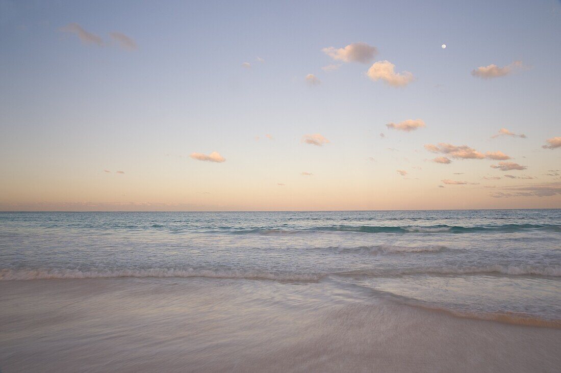 Clouds at sunset over Pink Sands Beach, Harbour Island, Eleuthera, The Bahamas, West Indies, Atlantic, Central America