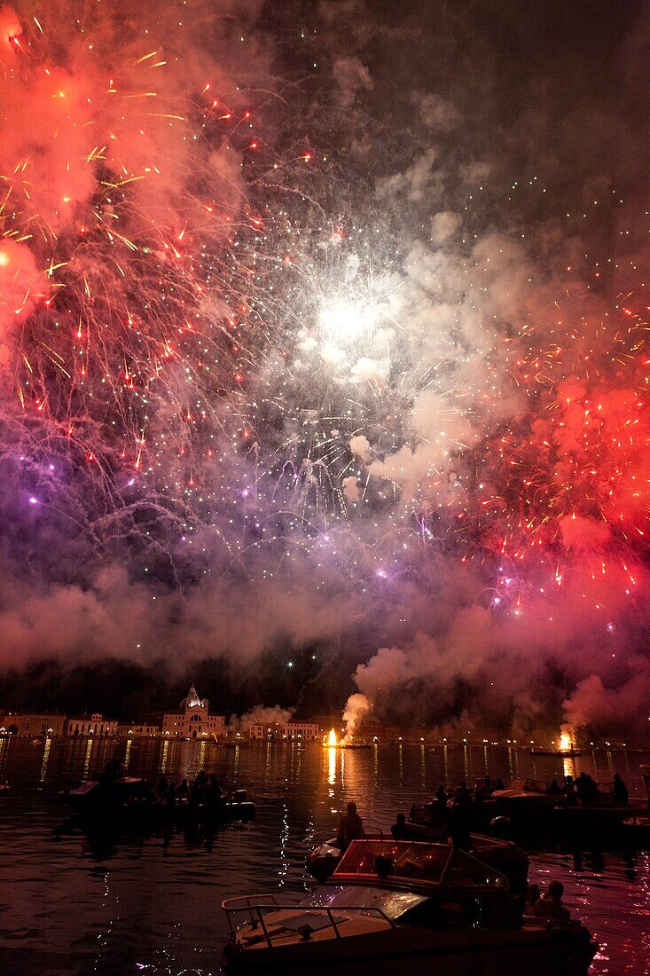 The amazing fireworks display during the night of Redentore celebration in the basin of St. Mark, Venice, Veneto, Italy, Europe