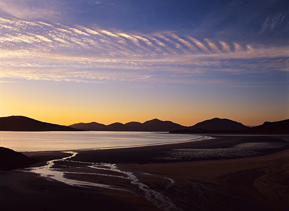 Seilebost in mid June just before sunset looking out towards the hills of northern Harris, Outer Hebrides, Scotland, United Kingdom, Europe