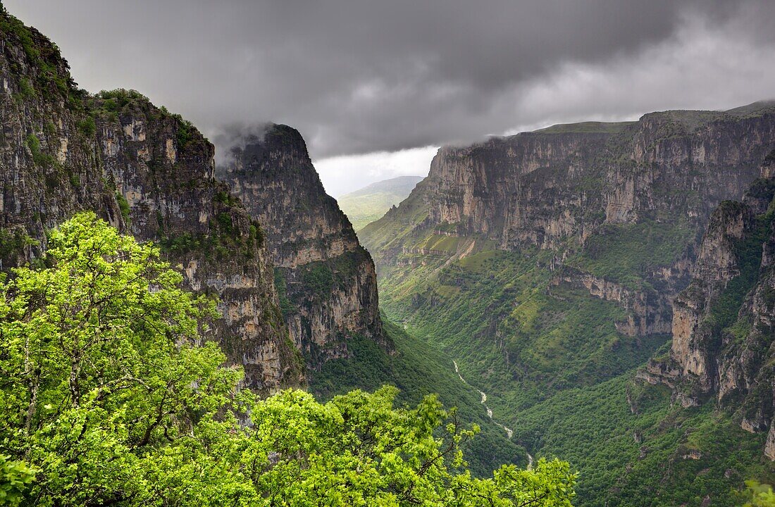 Rain and cloud over the Vikos Gorge from the Oxia viewpoint, Zagoria, Epirus, Greece, Europe