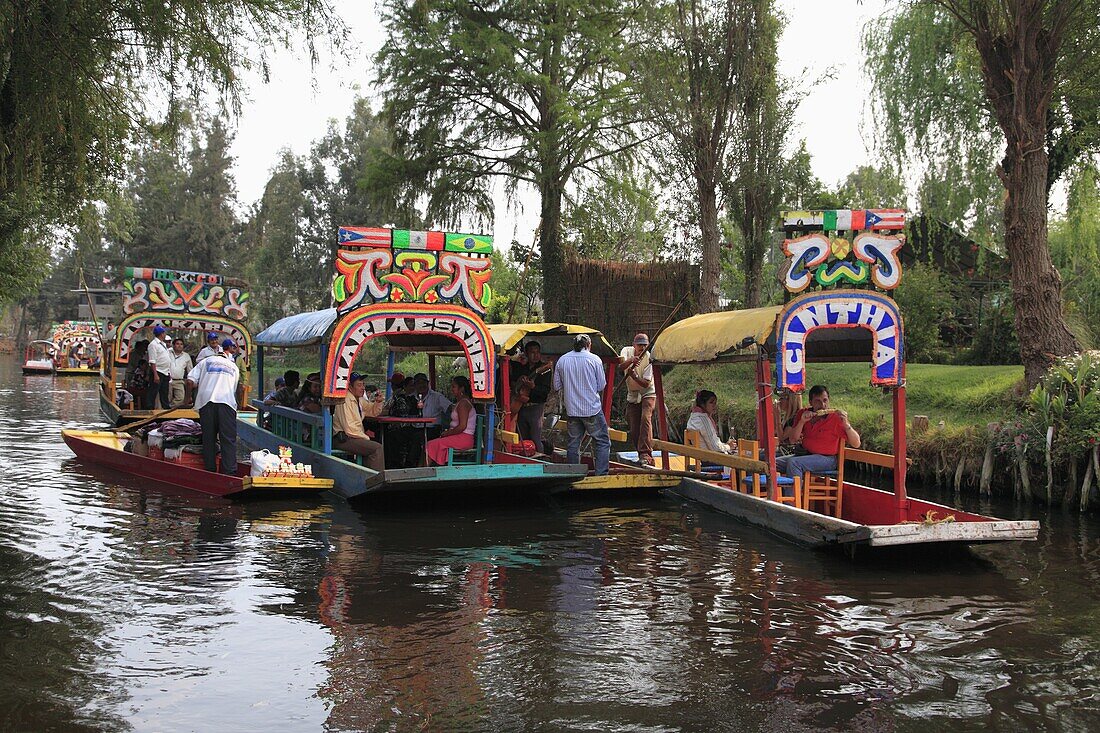 Brightly painted boats, Xochimilco, Trajinera, Floating Gardens, Canals, UNESCO World Heritage Site, Mexico City, Mexico, North America
