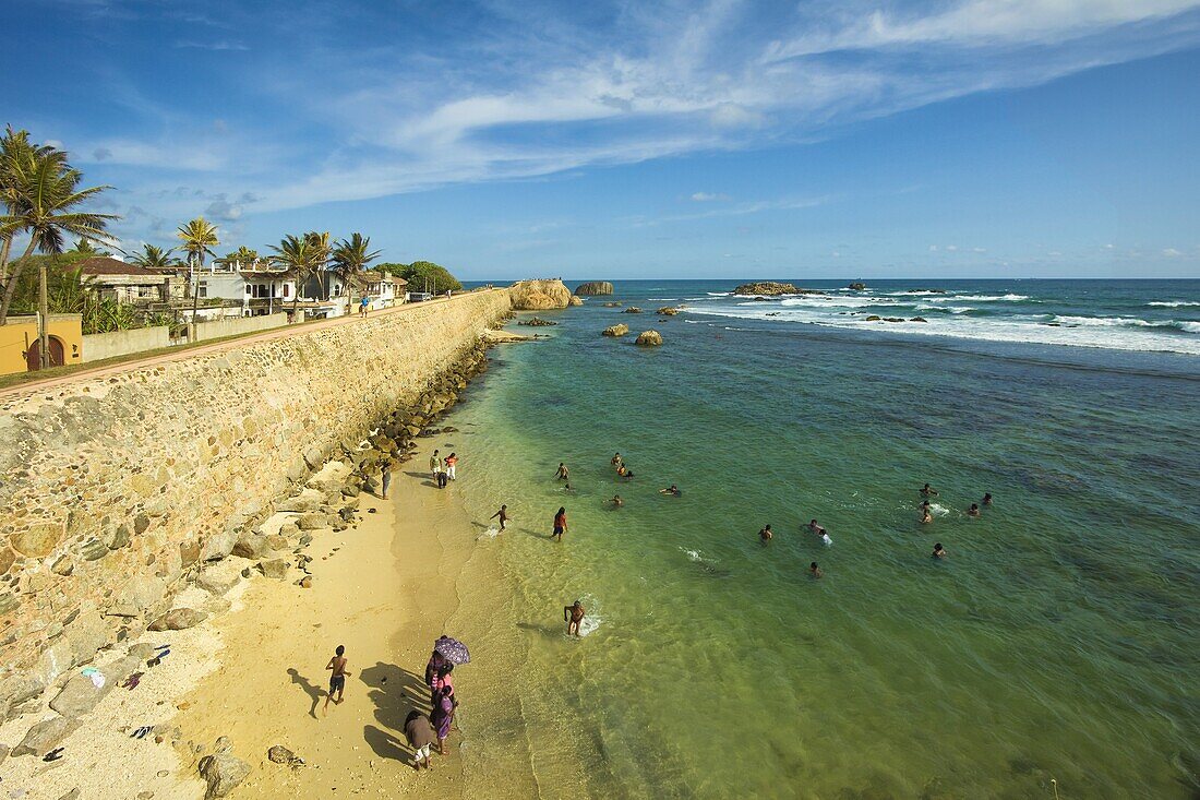 View along the rampart walls to Flag Rock, one of the former Portuguese bastions at the old Dutch Fort, UNESCO World Heritage Site, Galle, Sri Lanka, Asia