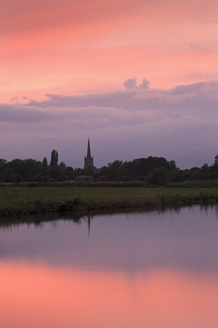 Beautiful sunset over the River Thames and the church spire of Lechlade, Oxfordshire, The Cotswolds, England, United Kingdom, Europe