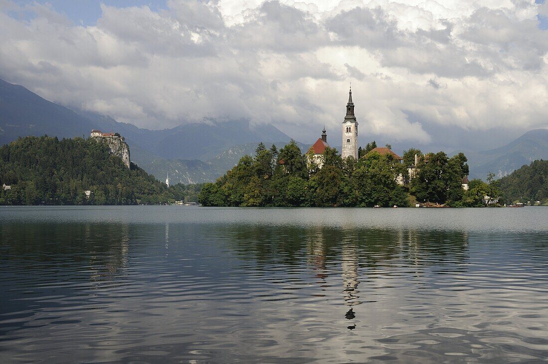 Lake Bled, St. Mary of the Assumption church on Bled Island and Bled castle, Slovenia, Europe