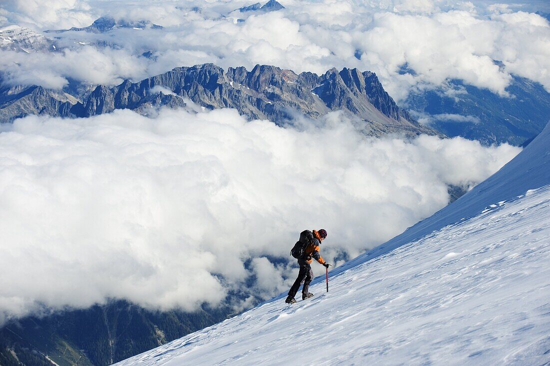 Climber on snow field, view from Mont Blanc, Chamonix, French Alps, France, Europe
