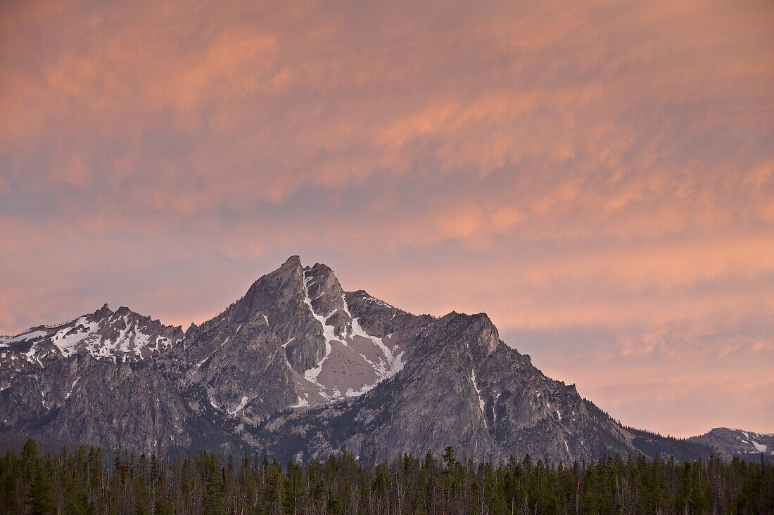 Orange clouds over McGowen Peak at sunset, Sawtooth National Recreation Area, Idaho, United States of America, North America