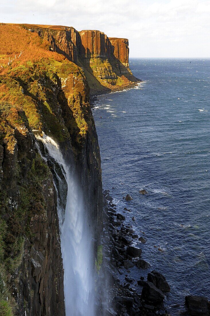 Waterfall at Kilt Rock, famous basaltic cliff near Staffin, Isle of Skye, Inner Hebrides, Scotland, United Kingdom, Europe