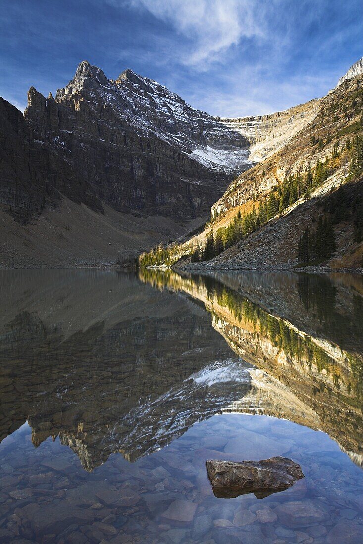 The shallow lake Agnes captures a perfect reflection of the mountain range, Banff National Park, UNESCO World Heritage Site, Alberta, Canada, North America