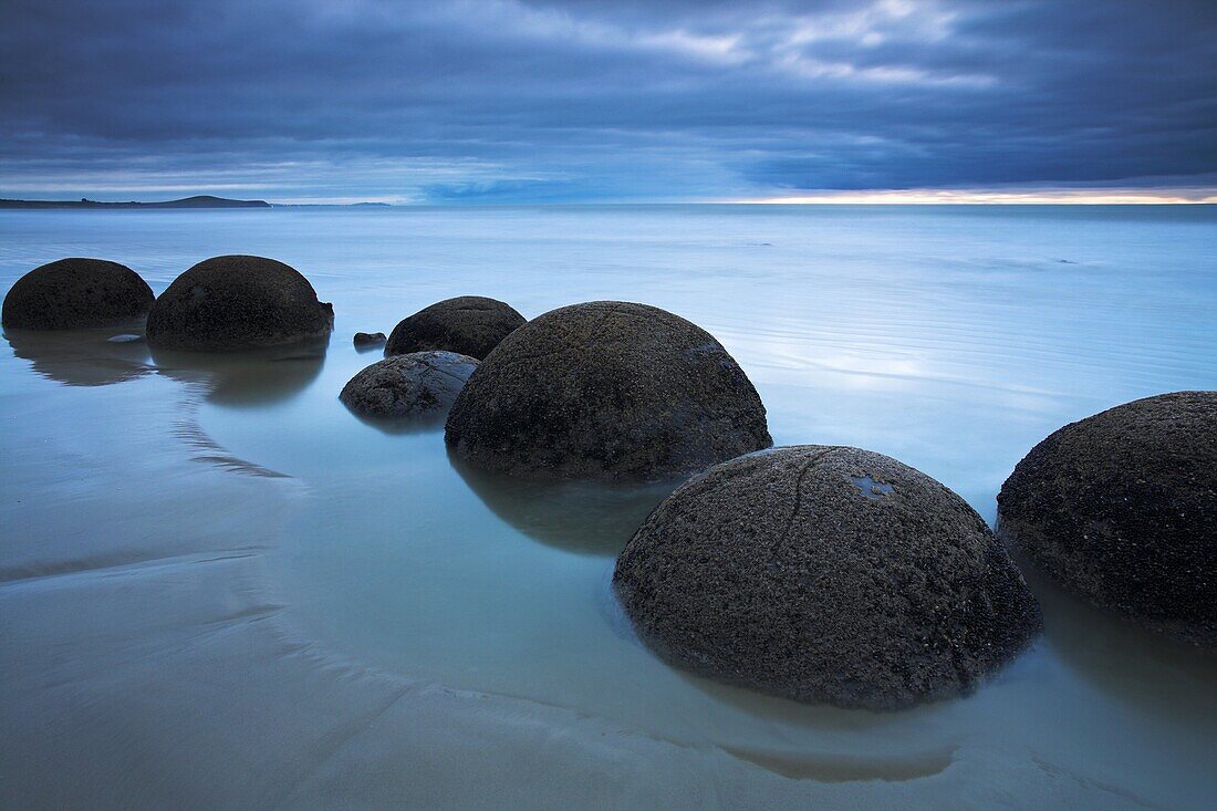 The unusual circular Moeraki boulders along the Otago Coast, Otago, South Island, New Zealand, Pacific