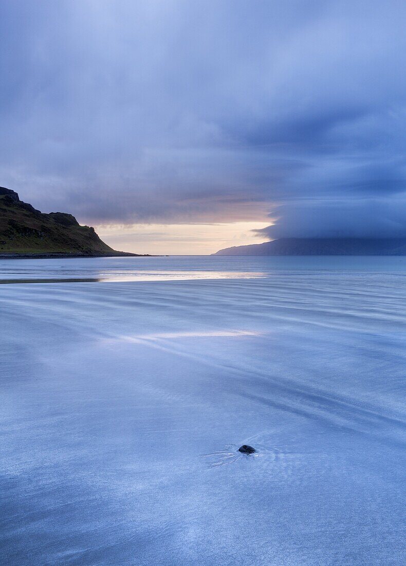 Early evening view towards Rum from the Bay of Laig on a stormy evening on the Isle of Eigg, Hebrides, Scotland, United Kingdom, Europe