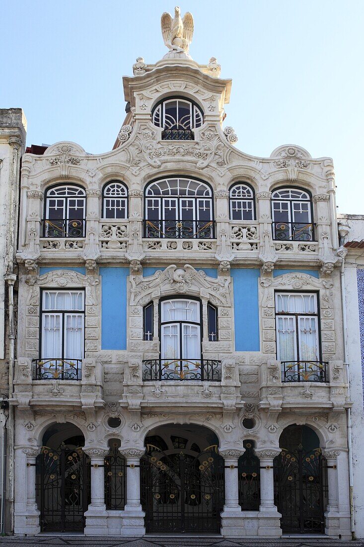 The ornate facade of one of the many Art Nouveau style buildings that line the Central Canal in Aveiro, Beira Litoral, Portugal