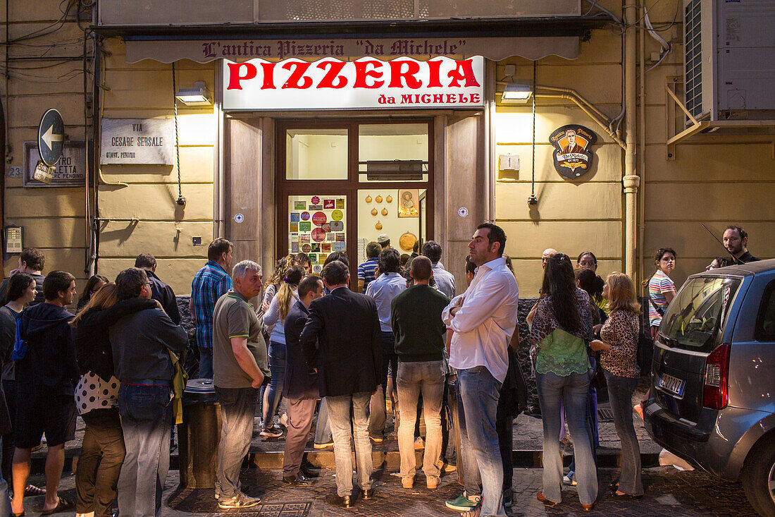 queue of customers waiting outside Pizzeria da Michele, Pizza, traditional, wood oven, popular, fast-food, Italian, restaurant, lifestyle, culture, Italian food, Naples, Italy