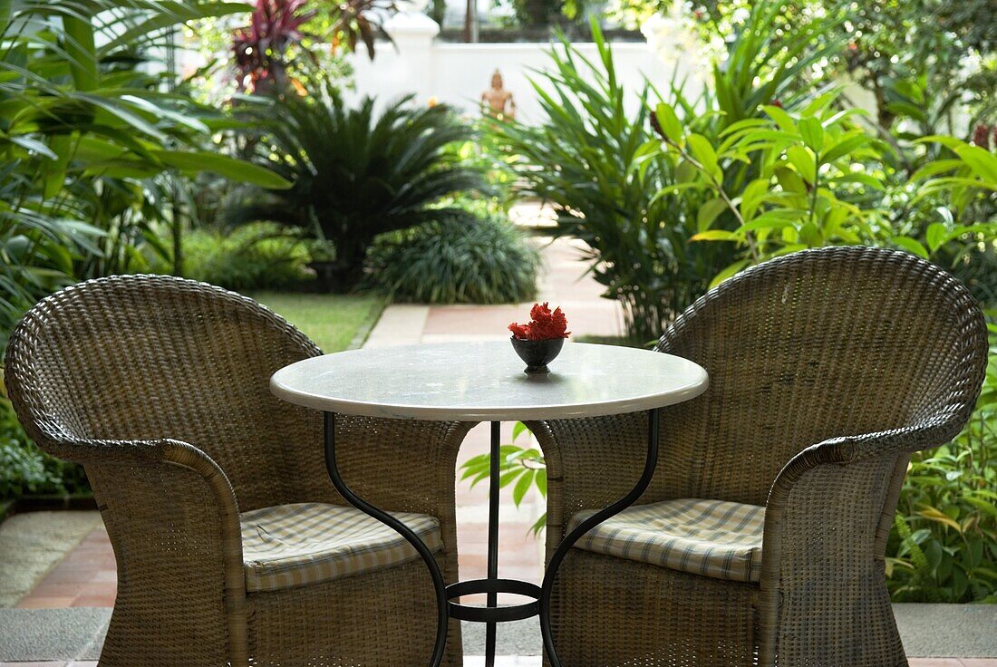 Terrace table and chairs in hotel, Kochi (Cochin), Kerala, India, Asia