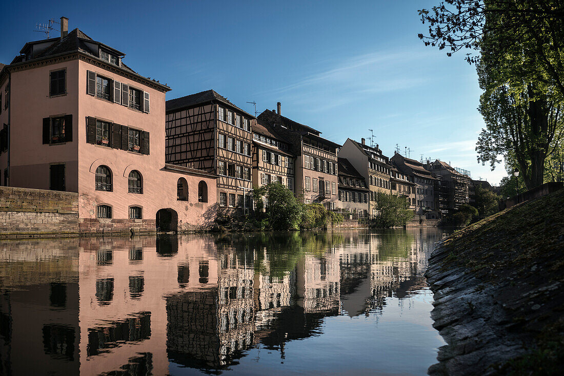 Timber frame houses reflecting in the river, tanner quarter, Petite France, Strasbourg, Alsace, France