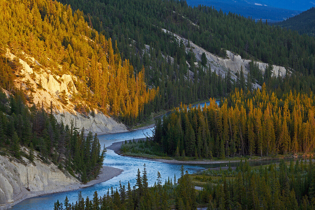 View along Bow River at sunset, Bow Valley, near Banff, Banff National Park, Rocky Mountains, Alberta, Canada