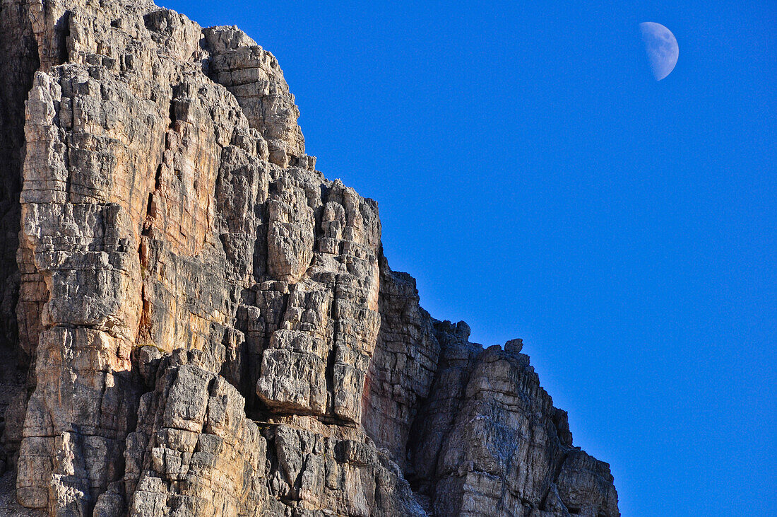 moonrise and half moon over  Three Peaks (Drei Zinnen), Val Pusteria Valley, Sesto, Dolomites, South Tyrol, Veneto, Alto Adige, Three Peaks (Tre Cime di Lavaredo) Nature Park, UNESCO world heritage side, Italy, European Alps, Europe