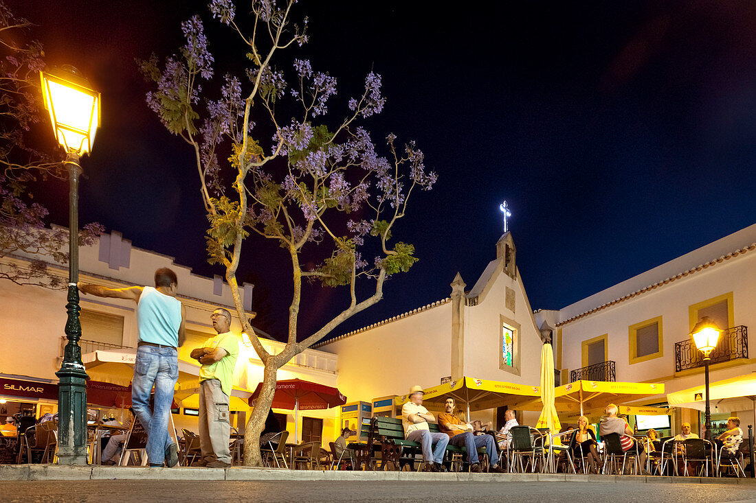 Old town at twilight, Cafe on the village square, Alvor, Algarve, Portugal