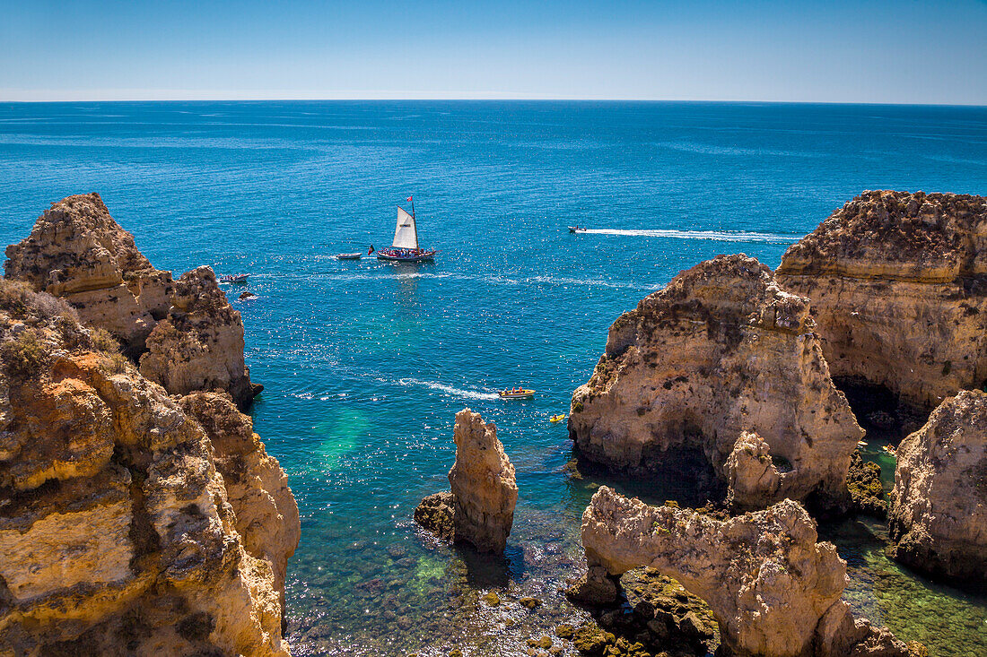 Sailing boat, Ponta de Piedade, Rocky coastline, Lagos, Algarve, Portugal