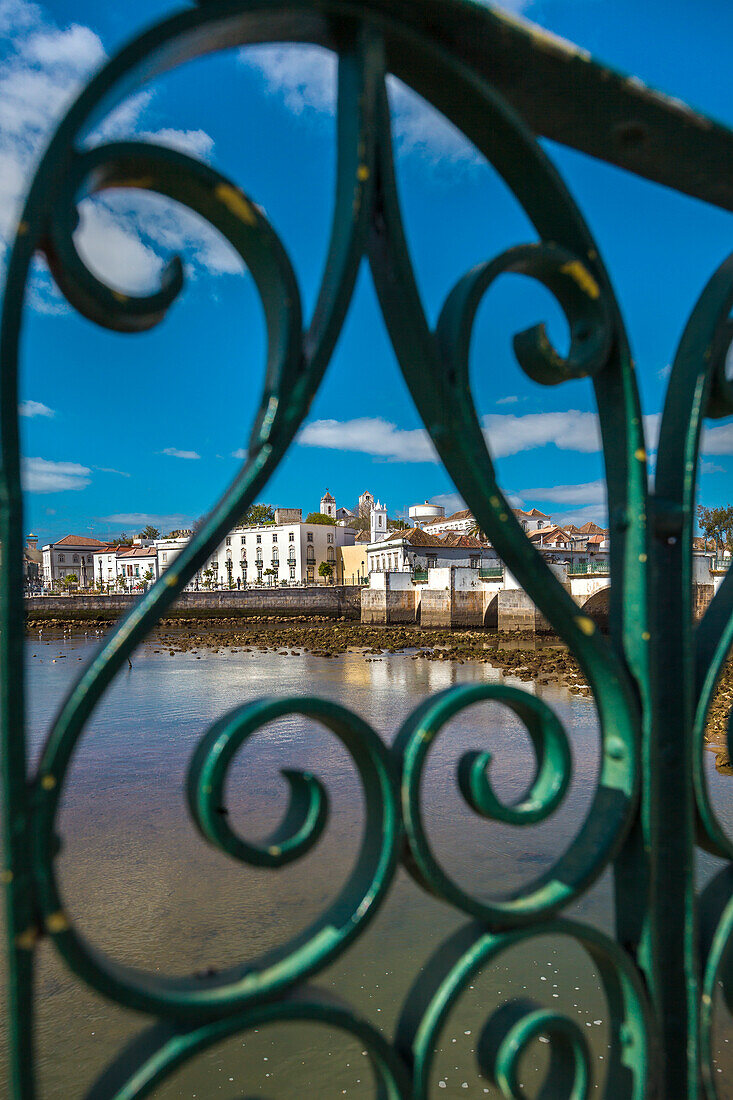 View across Rio Gilao towards old town and roman bridge, Tavira, Algarve, Portugal