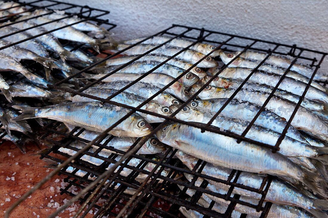 Sardines on a grill rack, Algarve, Portugal