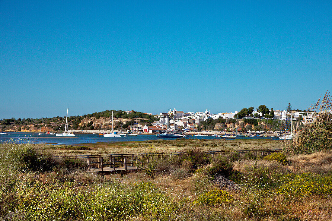 View across Ria de Alvor towards Alvor, Algarve, Portugal