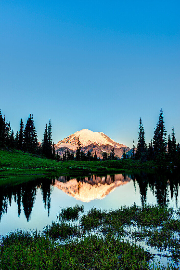 Mount Rainier reflected in pond at sunrise, Mount Rainier National Park