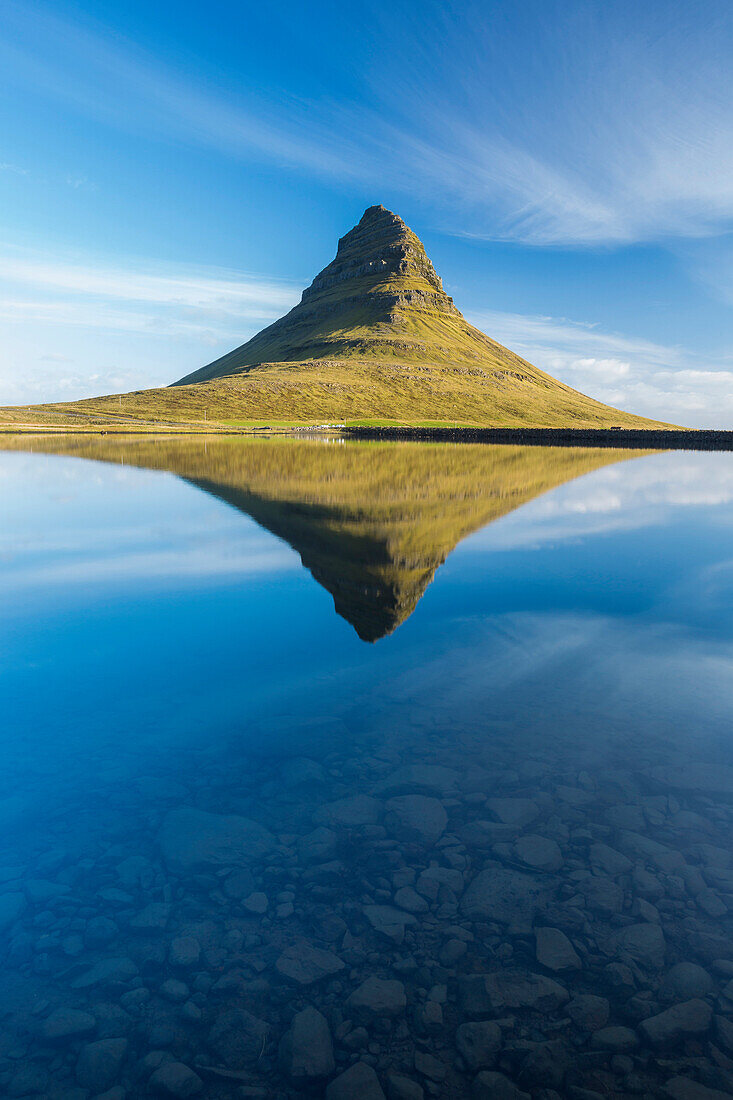 A reflection of Kirkjufell mountain on the Snaefellsnes peninsula in western Iceland.