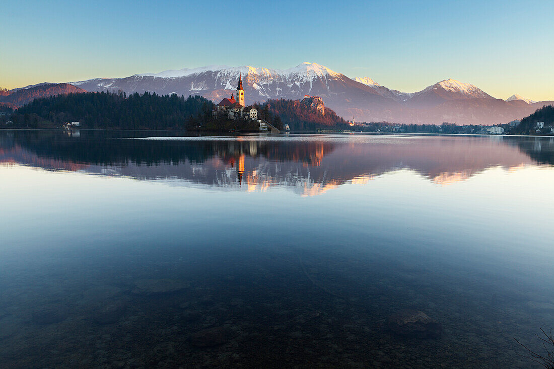 The Assumption of Mary Pilgrimage Church on Lake Bled and Bled Castle, Bled, Slovenia, Europe