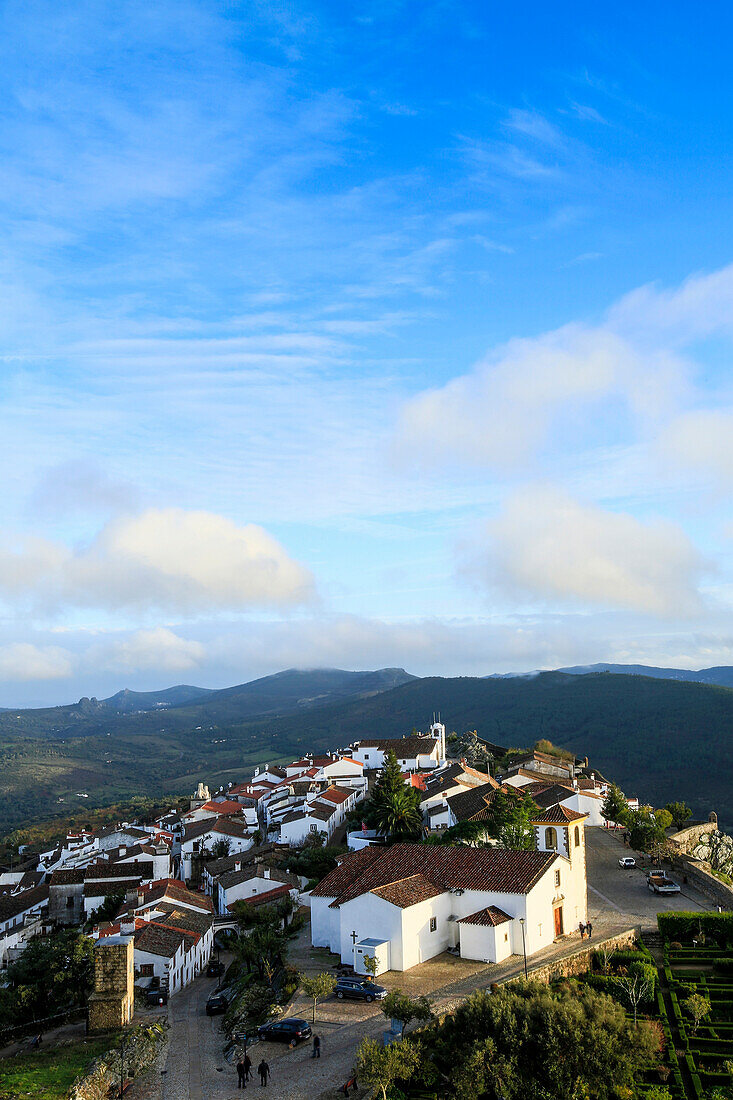 The 15th century parish church, medieval town and the Serra do Sao Mamede mountains, Marvao, Alentejo, Portugal, Europe