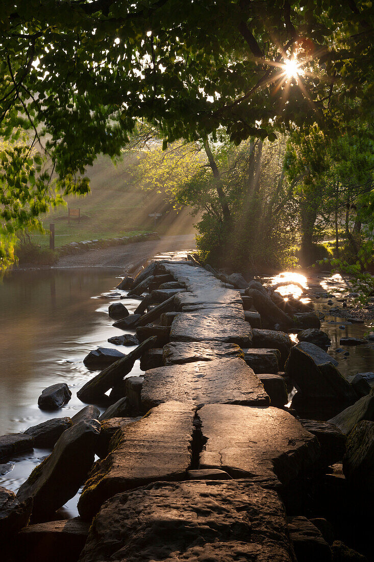 Ancient clapper bridge Tarr Steps spanning the River Barle in Exmoo National Park, Somerset, England, United Kingdom, Europe