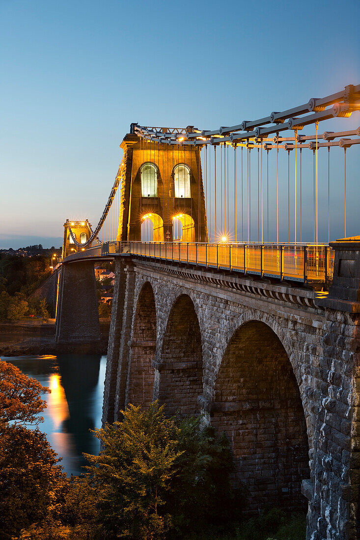 Menai Suspension Bridge at night, built in 1826 by Thomas Telford, Bangor, Gwynedd, Wales, United Kingdom, Europe