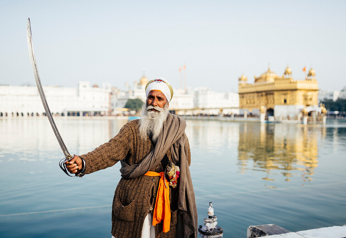 Portrait of Nihang Sikh man, Harmandir Sahib (Golden Temple), Amritsar, Punjab, India, Asia