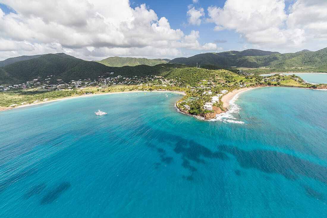 Aerial view of the small peninsula that houses Carlisle Resorts luxurious paradise for tourist of Caribbean, Antigua, Leeward Islands, West Indies, Caribbean, Central America