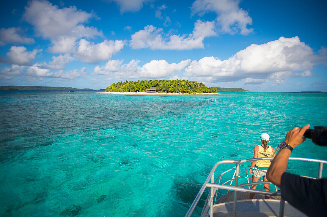Tourists view Mounu Island from a boat, Vavau, Tonga