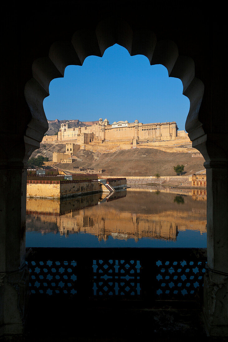 Looking out of archway to Amber Fort, Amer, Jaipur, India