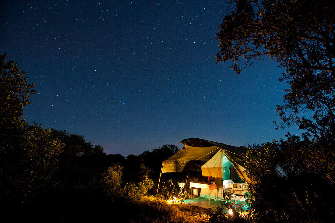 Safari tent under a starry sky at night, Ol Pejeta Conservancy, Kenya