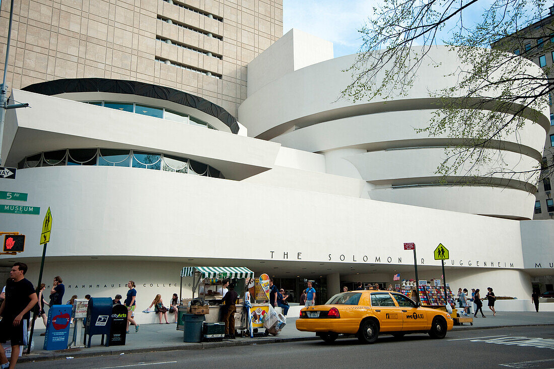 Taxi In Front Of The Guggenheim Museum, Museum Mile, Manhattan, New York, Usa