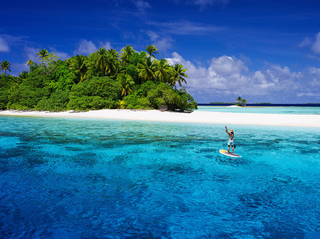 Paddle boarding off a remote island, Marshall Islands