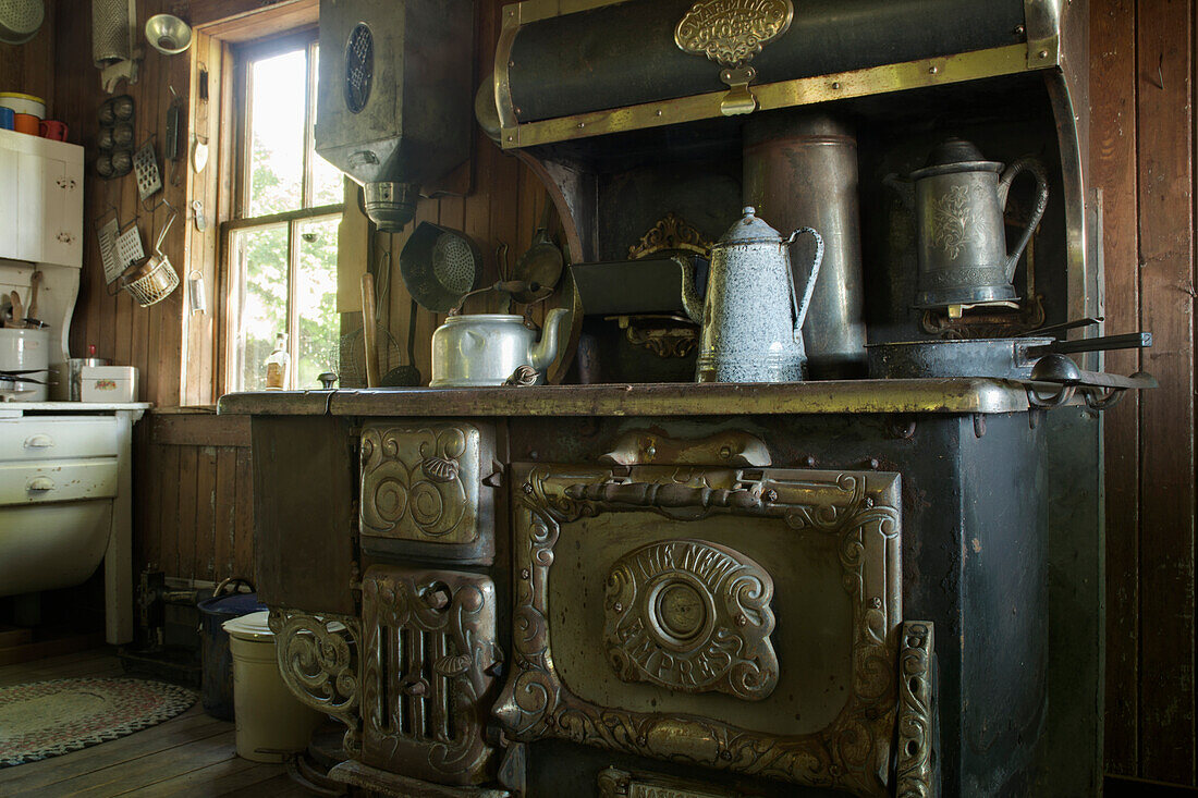 'Old French settlement kitchen and antique wood oven; Trochu, Alberta, Canada'