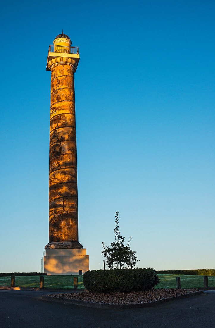'Morning sunlight illuminates the Astoria Column; Astoria, Oregon, United States of America'