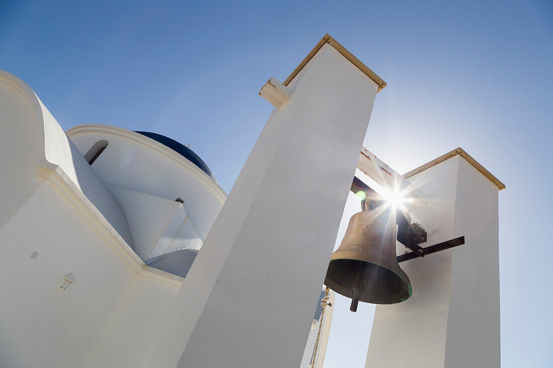 'A bell tower with a sunburst behind; Paphos, Cyprus'