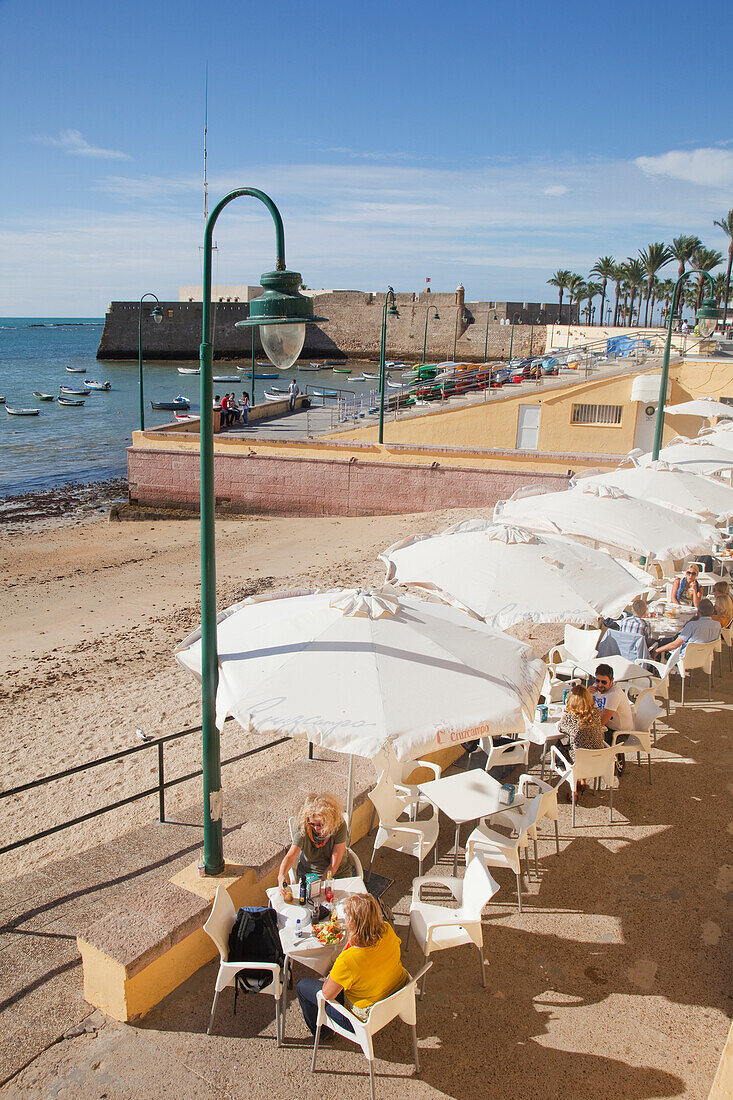 'Restaurant patio at the waterfront; Cadiz de la Frontera, Andalusia, Spain'