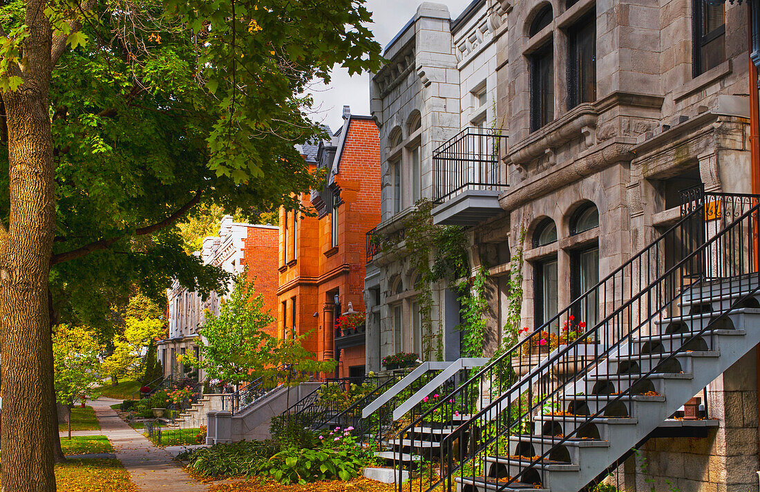 'Apartment buildings along city street; Montreal, Quebec, Canada'