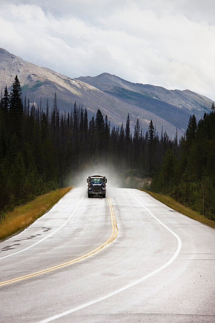 Truck On Road In Banff National Park, Alberta, Canada.