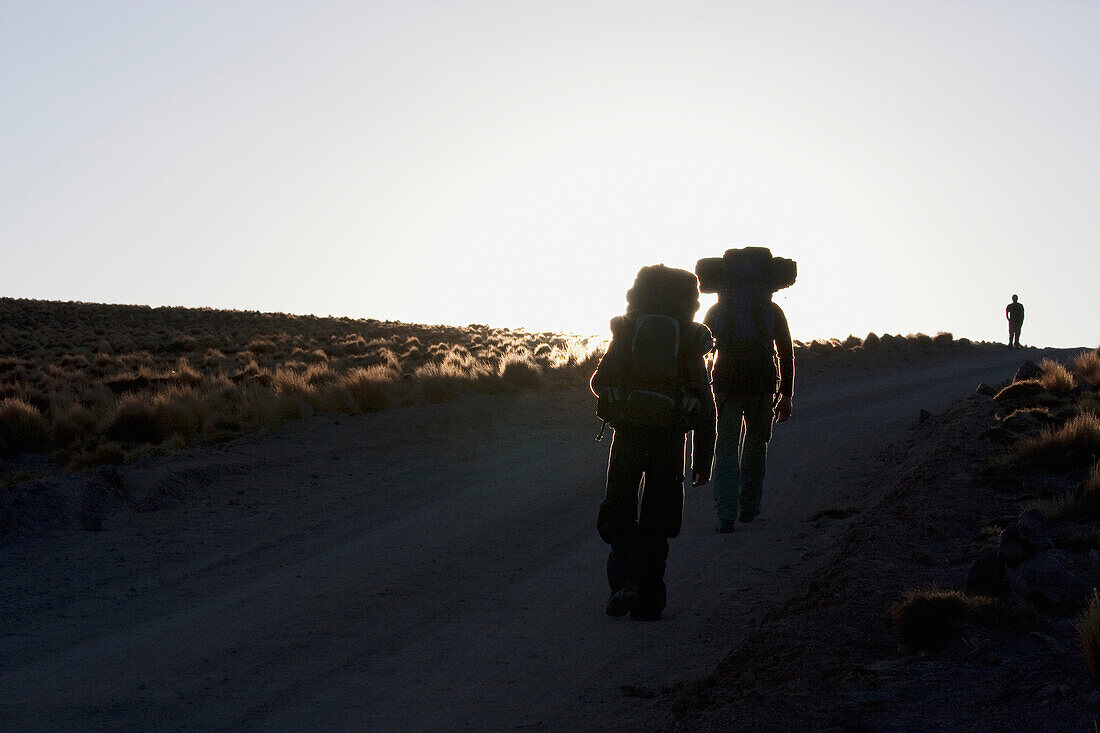 Silhouette Of Hikers In The Miscanti And Miniques Lagoon Area, Antofagasta Region, Chile