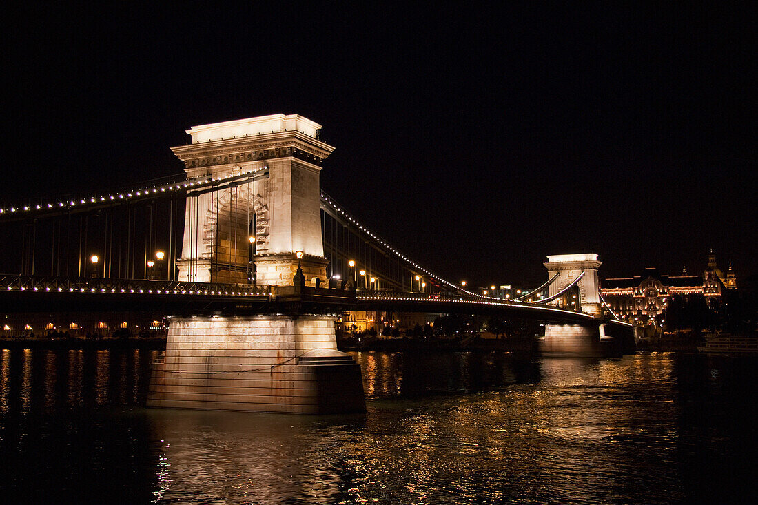 Szechenyi Chain Bridge Over The Danube River At Night, Budapest, Hungary