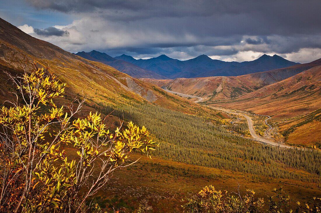 Scenic view of Brooks Range, Dietrich River and the Dalton Highway, Gates of the Arctic National Park & Preserve, Arctic Alaska, Autumn.