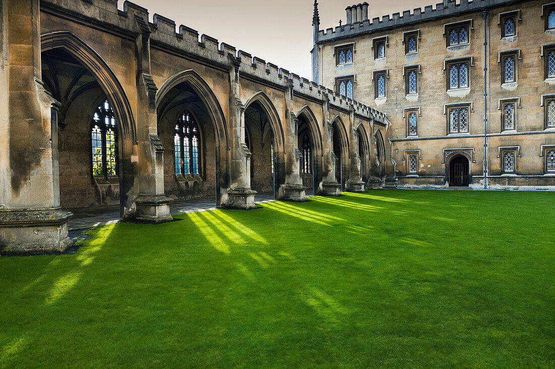 Courtyard with lush green grass, Cambridge, England